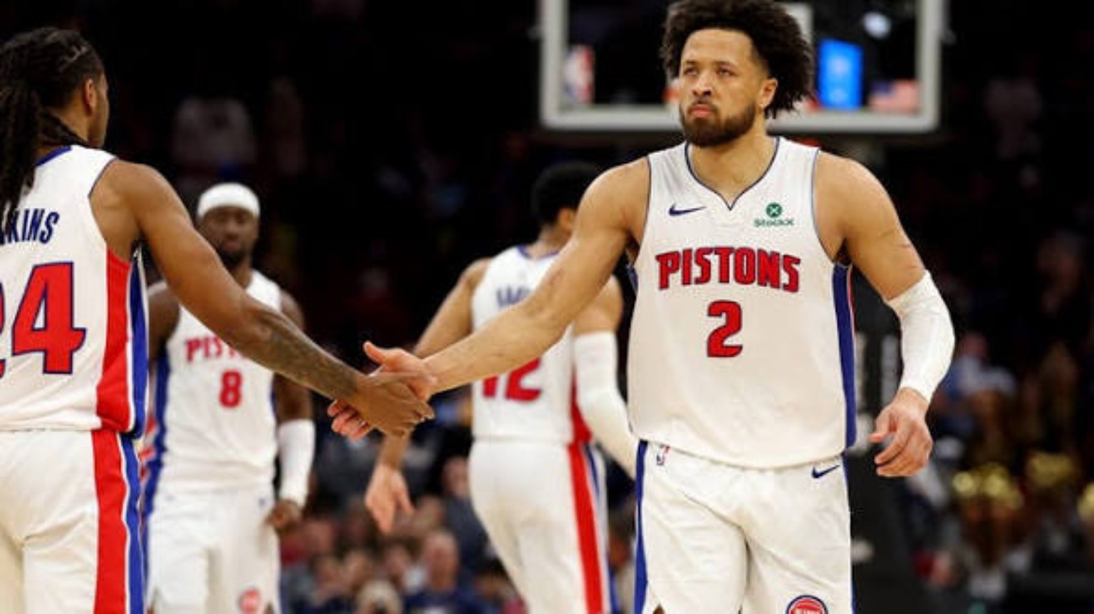 Cade Cunningham in a Detroit Pistons jersey