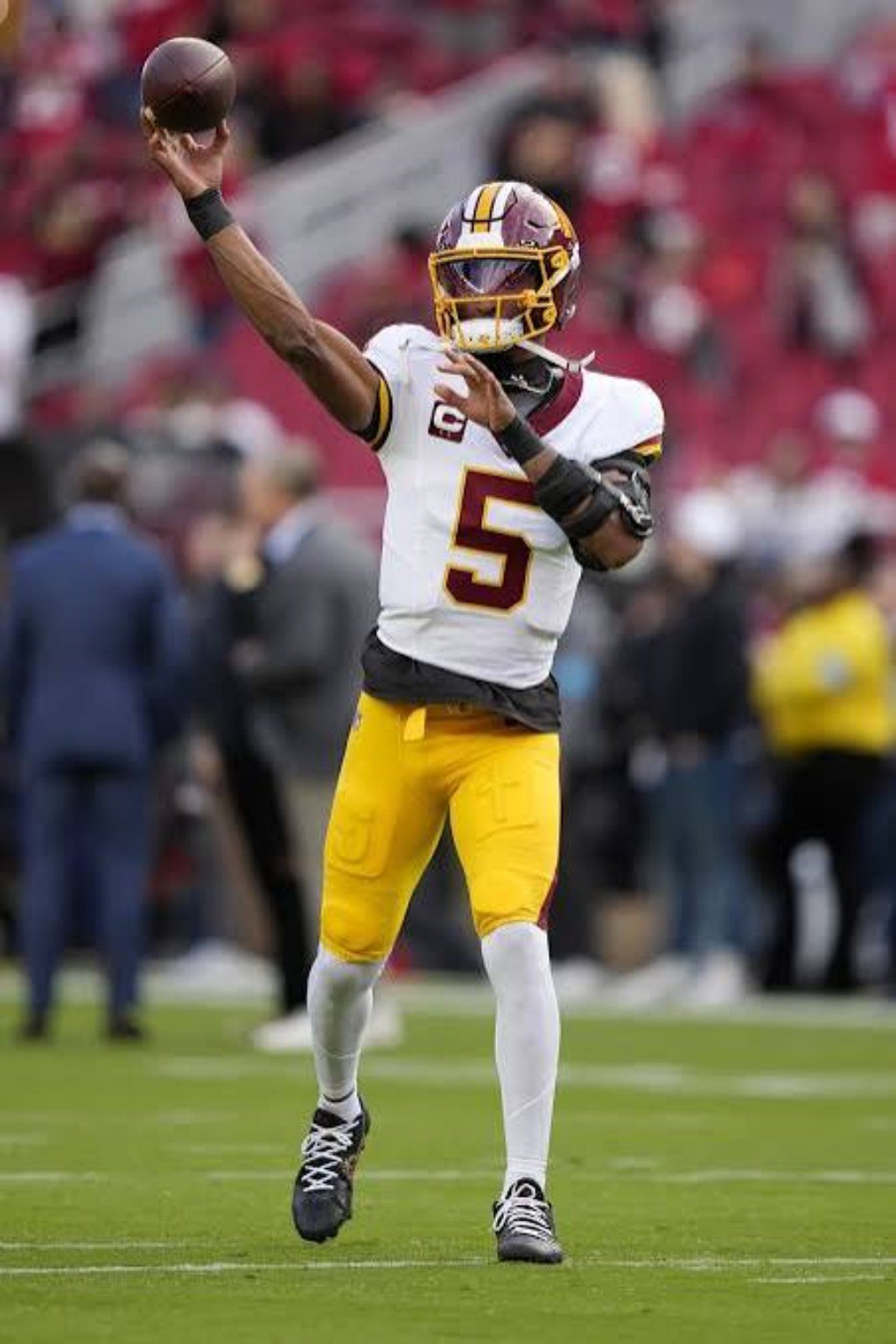 Jayden Daniels throws against the 49ers as Washington rallies in the second half.