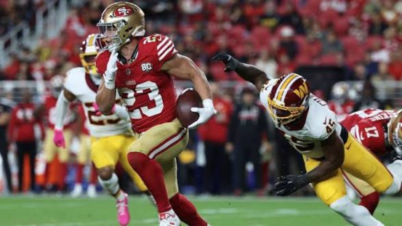 Christian McCaffrey running against Washington in Week 6