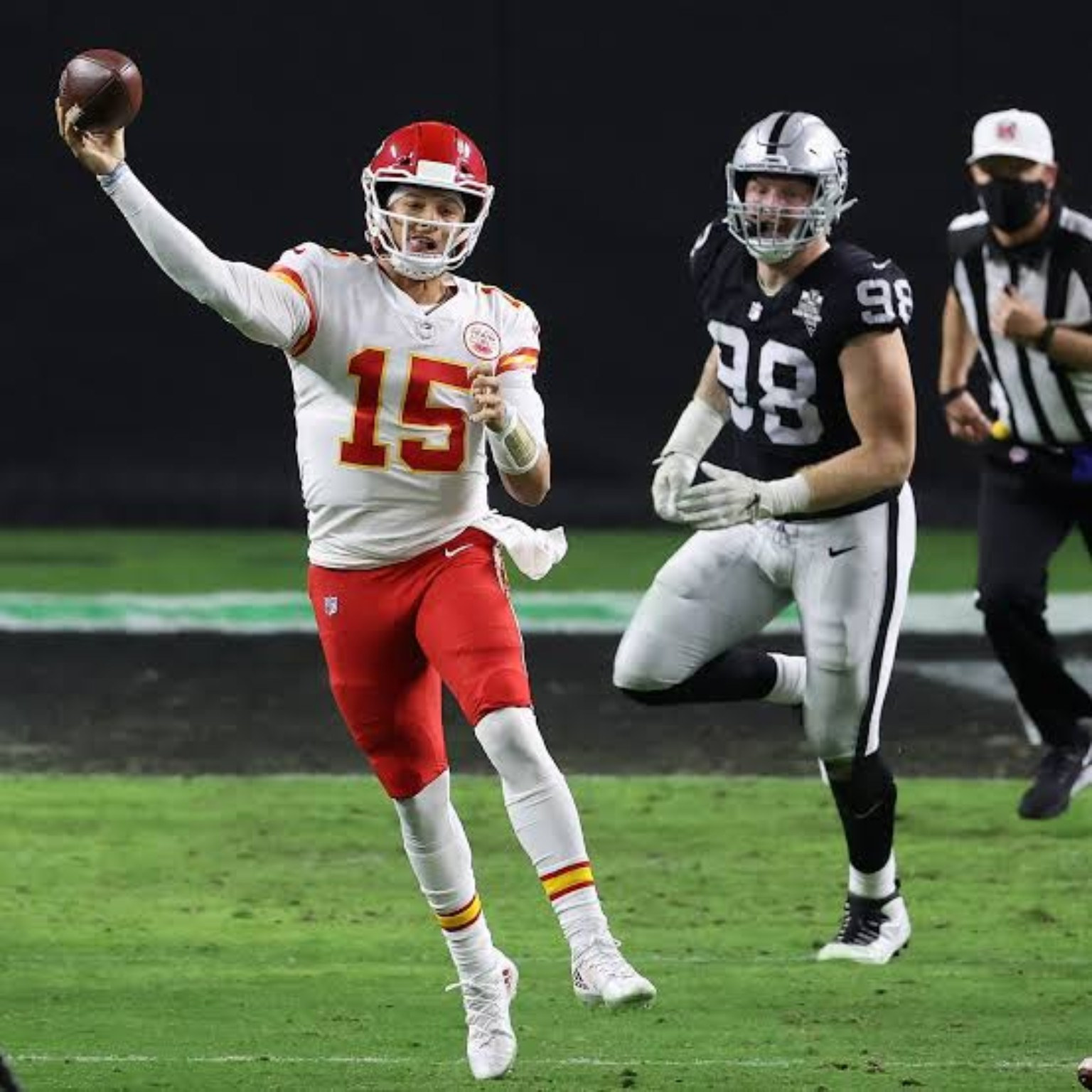 User-supplied archival-style NFL action photo of Patrick Mahomes throwing against the Raiders