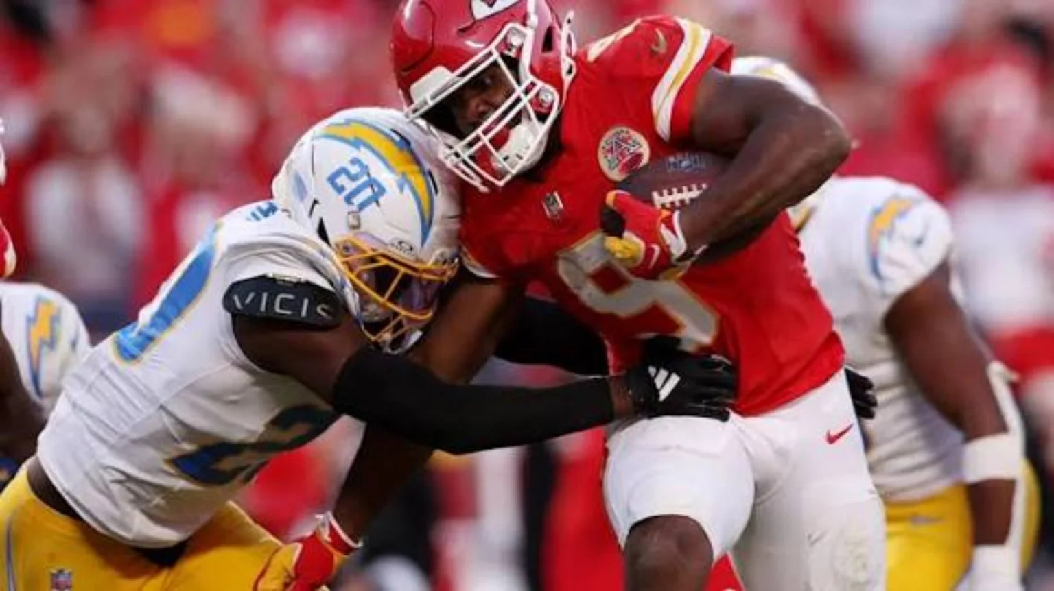 Kansas City Chiefs ball carrier breaking a tackle against the Los Angeles Chargers
