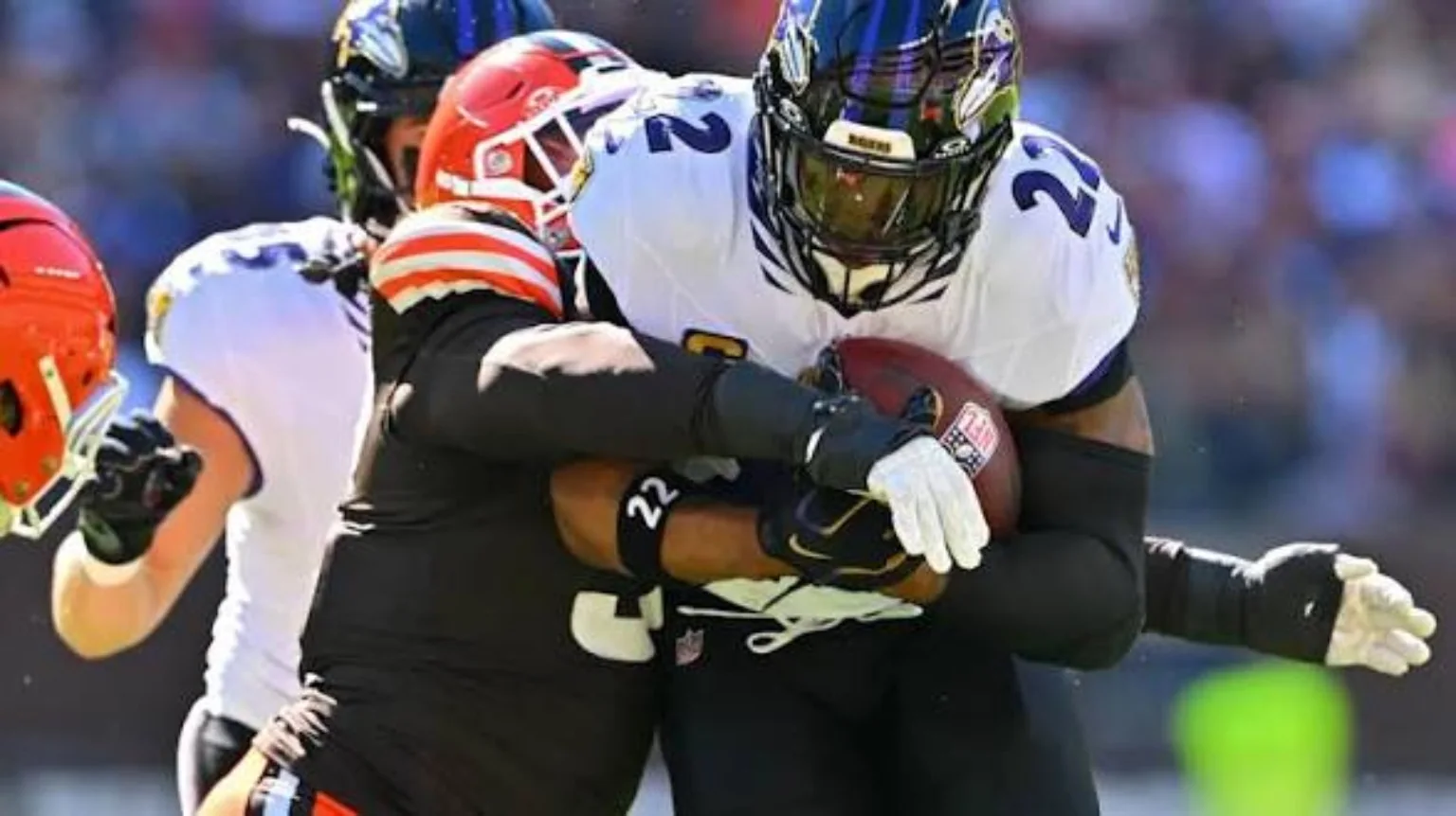 Baltimore Ravens ball carrier met by Cleveland Browns defenders