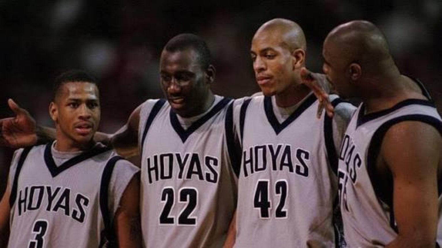 Allen Iverson standing with Georgetown Hoyas teammates
