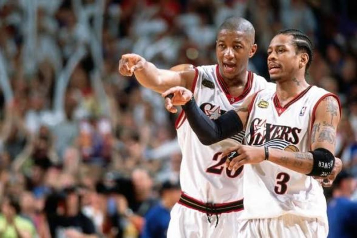 Allen Iverson and Dikembe Mutombo together in Philadelphia 76ers uniforms during the 2001 Finals run