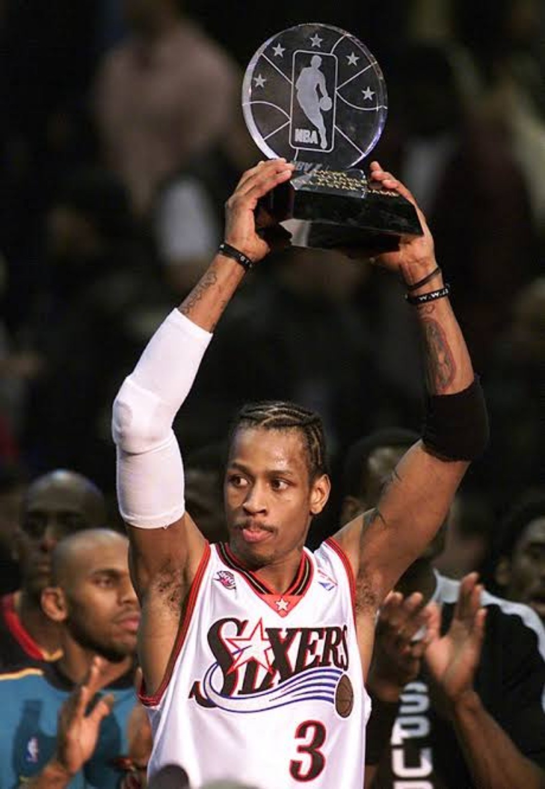 The NBA Most Valuable Player trophy being raised after the award presentation