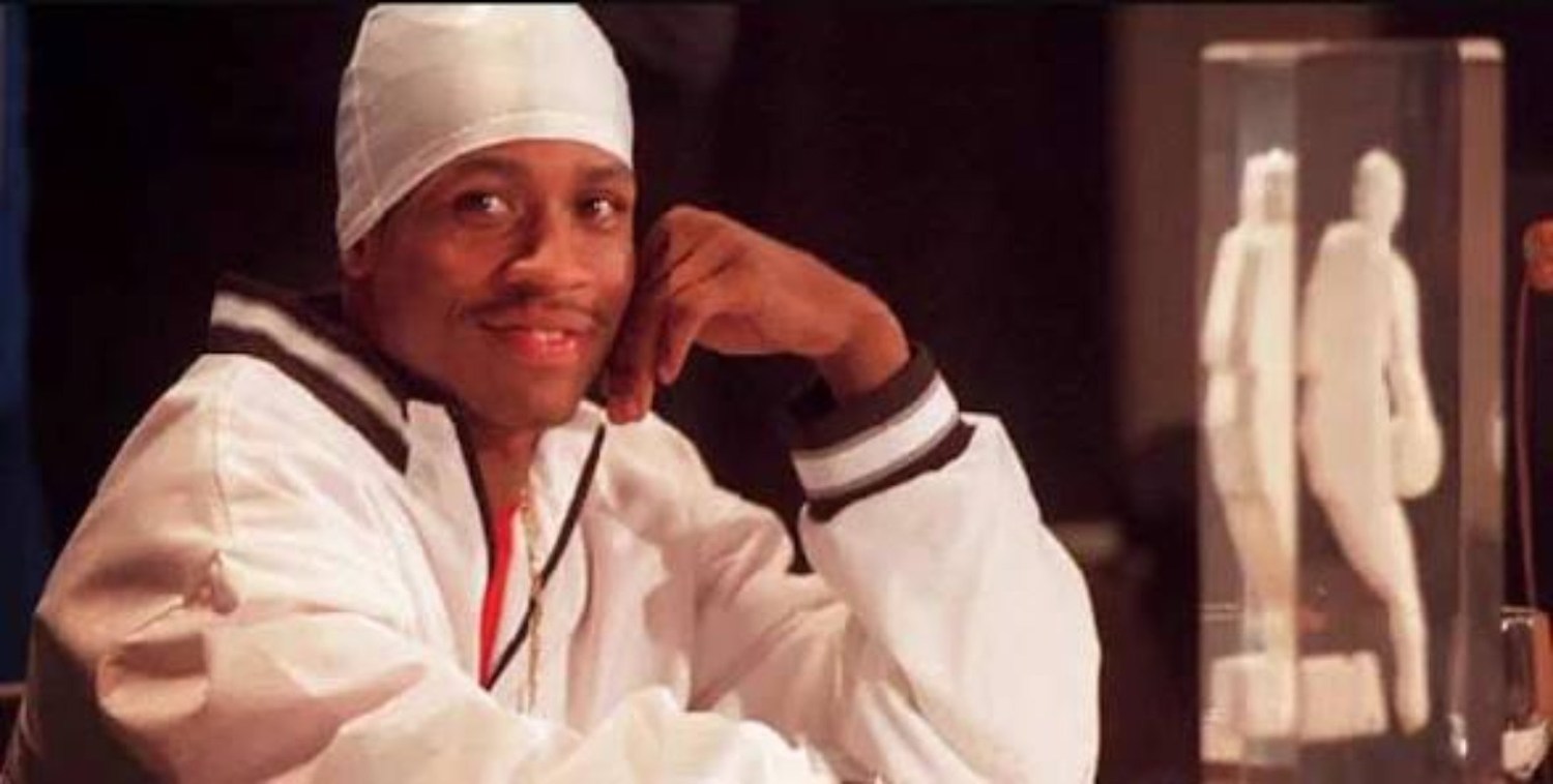 Young Allen Iverson wearing a white durag and white outfit during his early NBA years