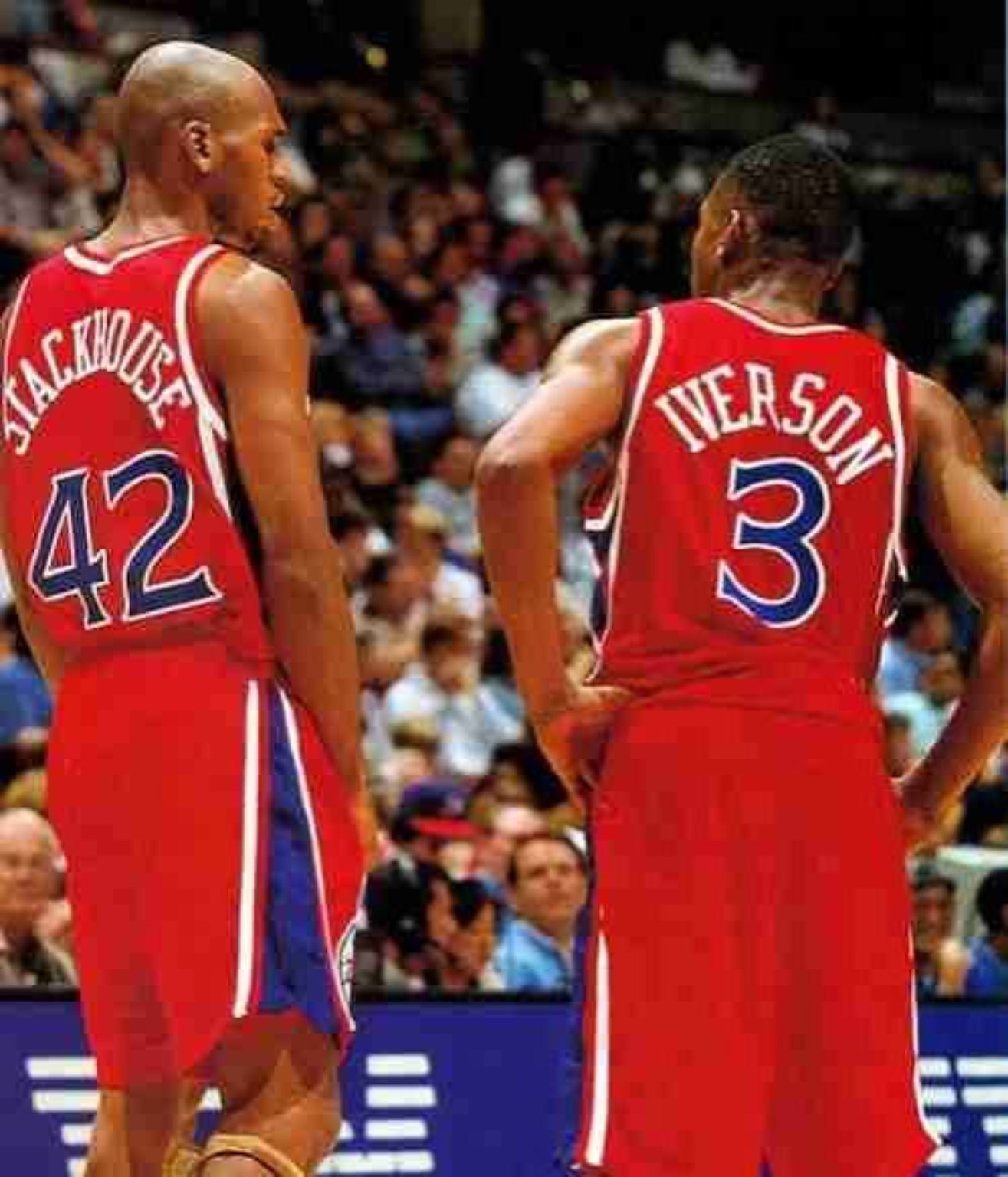 Jerry Stackhouse and Allen Iverson together in red Philadelphia 76ers uniforms