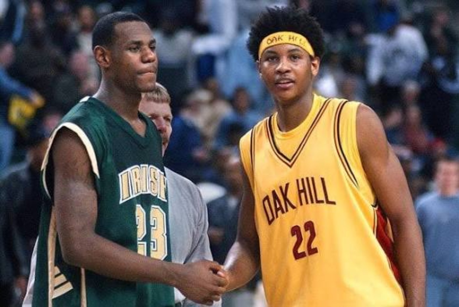 High-school LeBron James in a St. Vincent–St. Mary jersey alongside Carmelo Anthony wearing Oak Hill Academy yellow