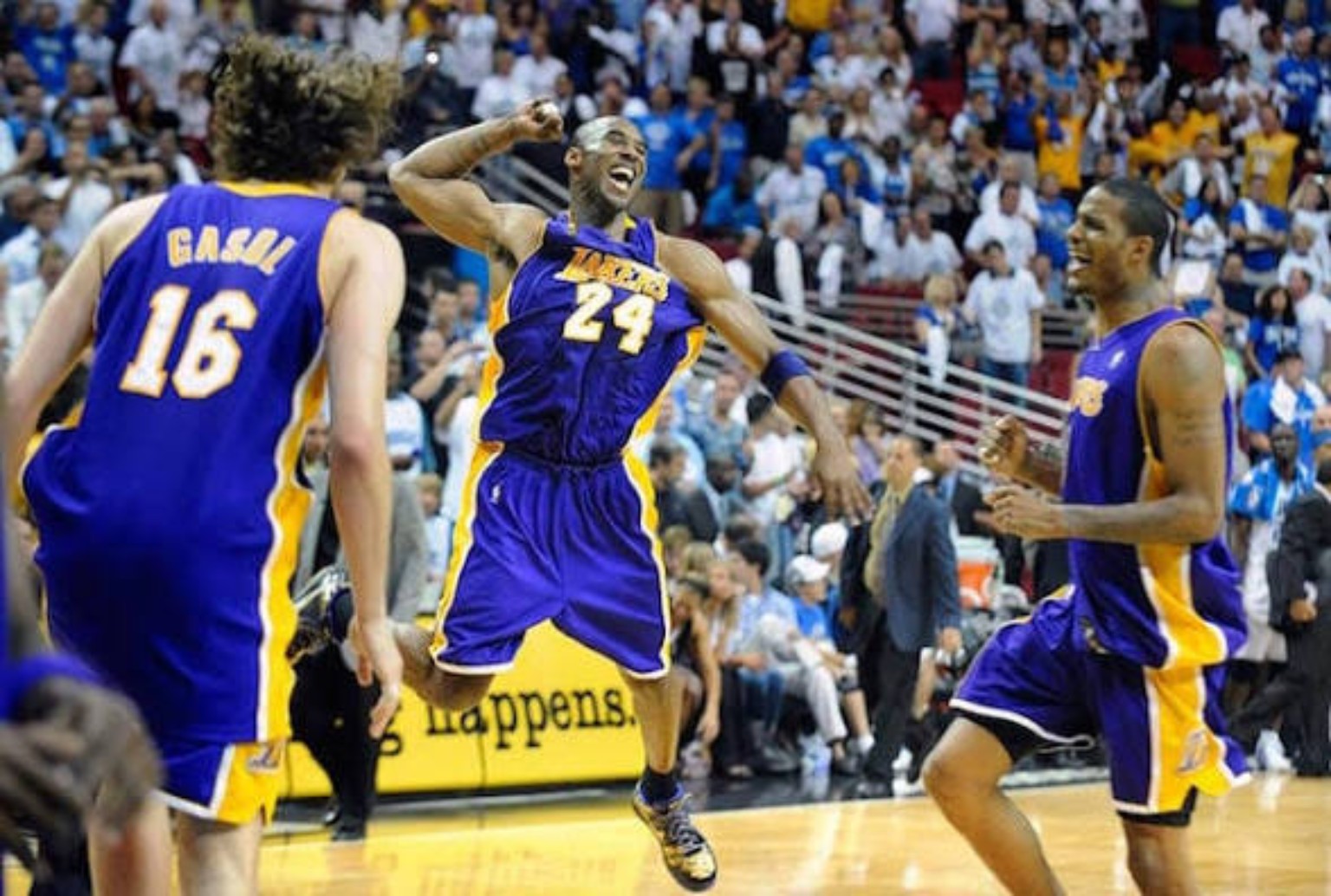 Kobe Bryant celebrating with Pau Gasol and Trevor Ariza