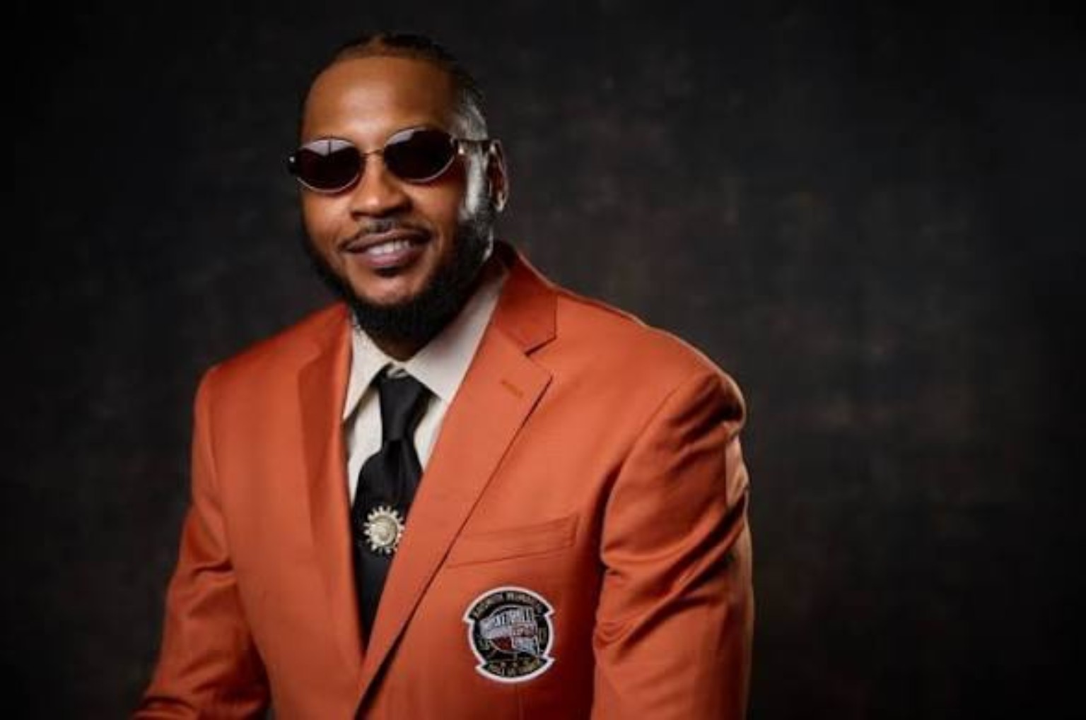Carmelo Anthony wearing his Basketball Hall of Fame jacket