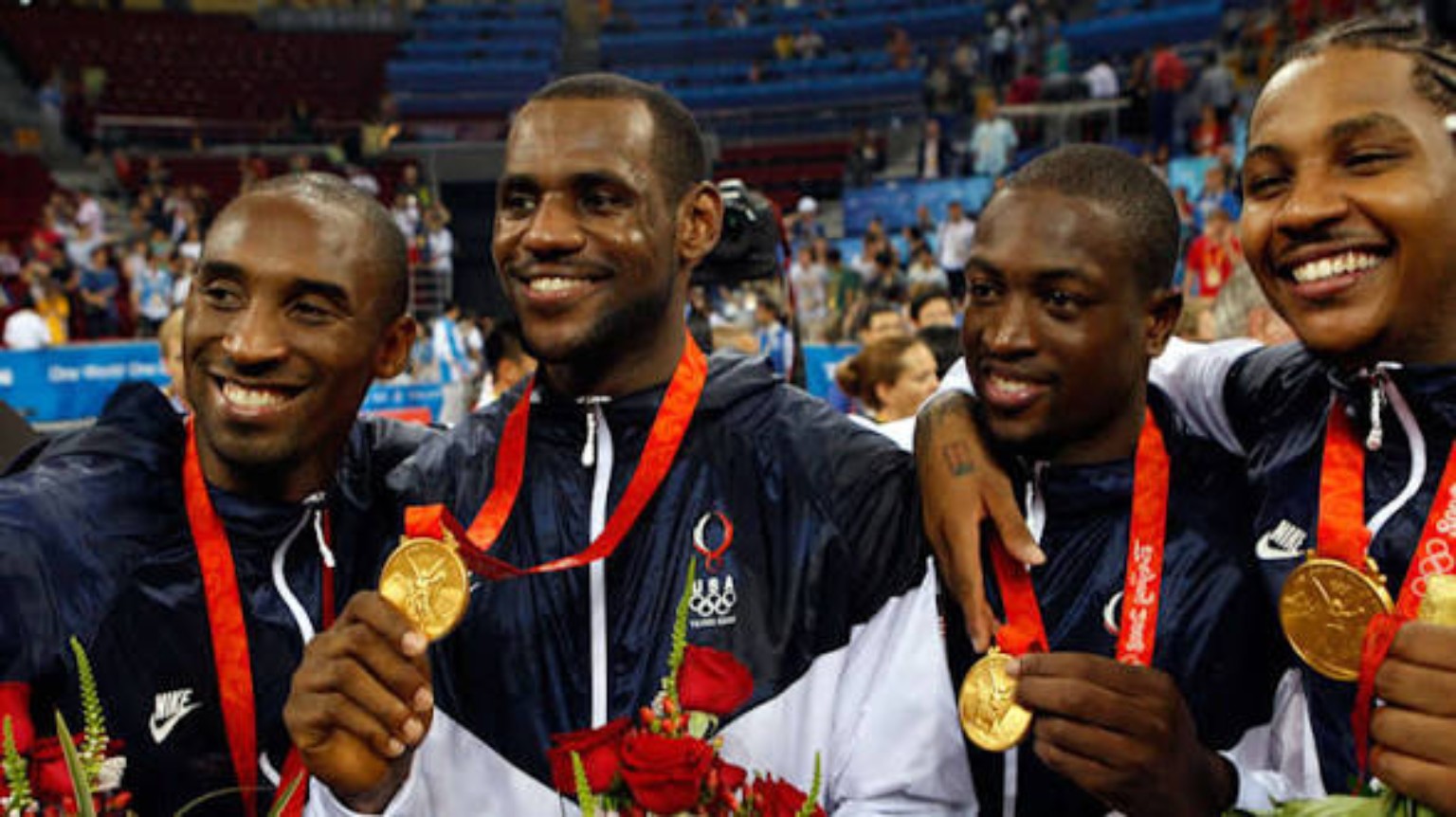 Team USA basketball players celebrating Olympic gold